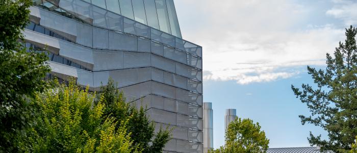Gates Hall through trees