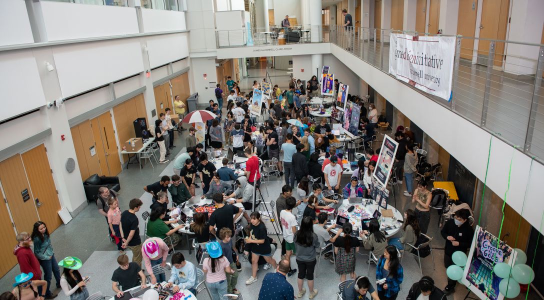 A color photo showing an overhead shot of the 2023 GDIAC Game Design Showcase