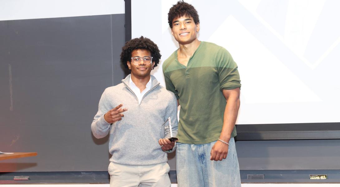 A color photo of 2 men.