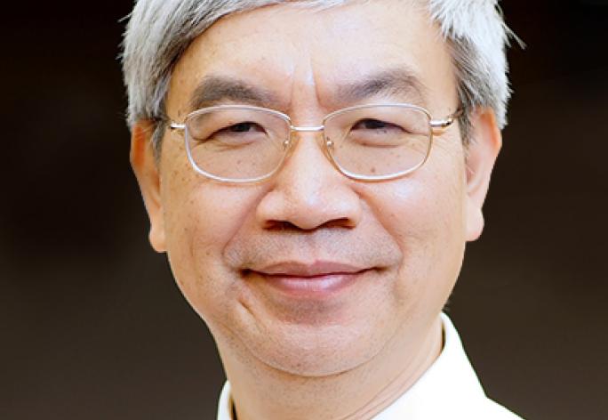 Portrait of man with glasses and graying hair