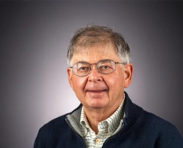 A color photo of David Ruppert in front of a gray background