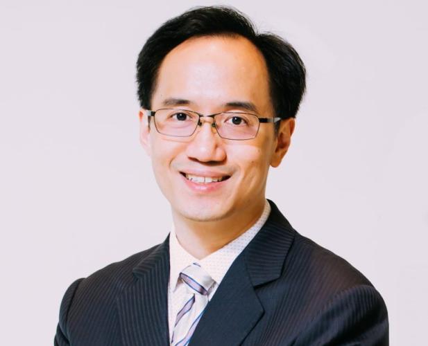 portrait Man in suit and wearing glasses