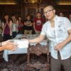 A student receives an award.