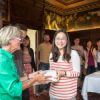 A student receives an award.